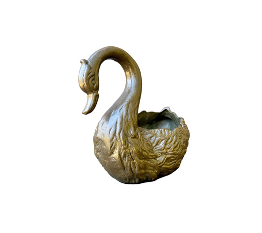 Antique bronze planter with intricate swan design and patina finish