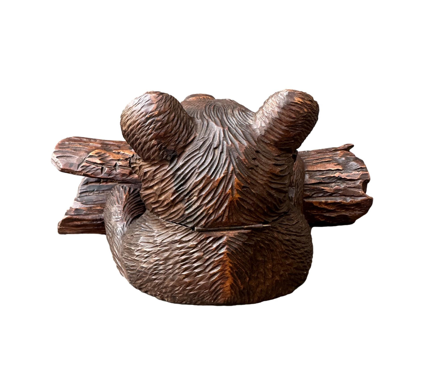Antique Black Forest inkwell featuring a hand-carved bear holding an ink pot