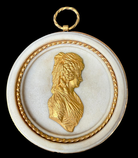 Pair of Louis XVI gilt bronze and marble portrait medallions, depicting Franz I and Maria Theresa, circa 1792