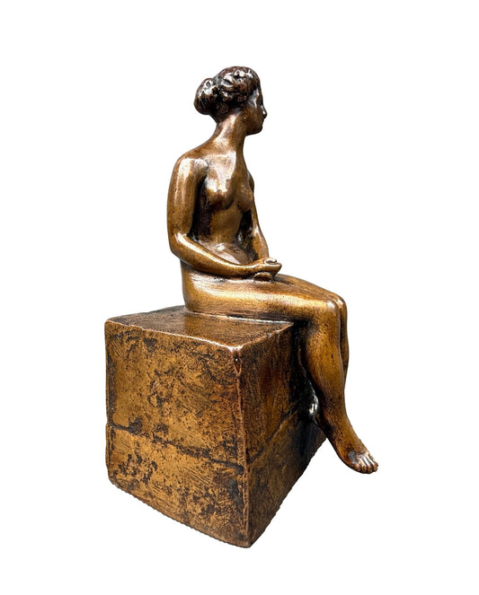 Bronze sculpture of a seated nude woman by Ary Bitter, Art Deco style with warm medal patina, signed on the back