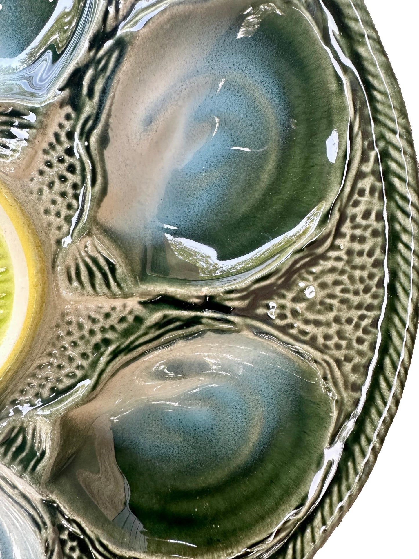 Vintage French Majolica oyster plate by Saint Clément, circa 1930, with six green-blue shell wells and a central lemon design, glazed ceramic faience, Art Deco coastal decor.