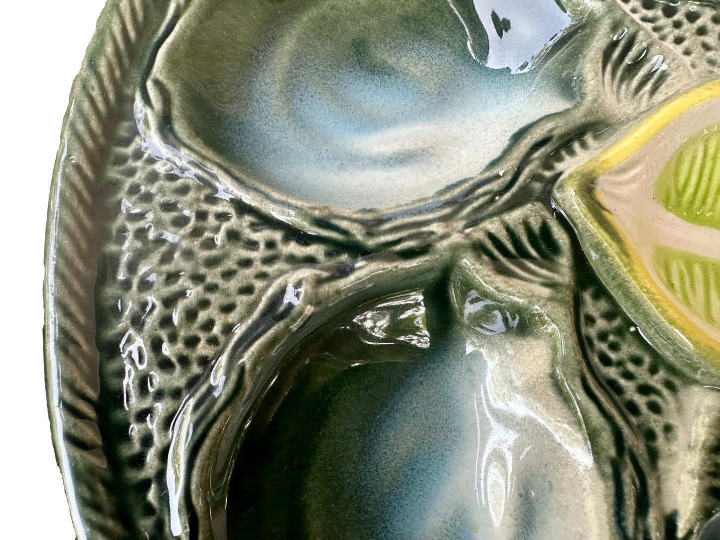 Vintage French Majolica oyster plate by Saint Clément, circa 1930, with six green-blue shell wells and a central lemon design, glazed ceramic faience, Art Deco coastal decor.