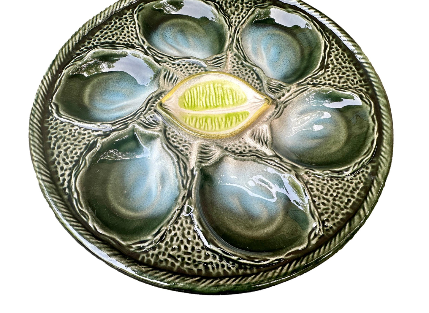 Vintage French Majolica oyster plate by Saint Clément, circa 1930, with six green-blue shell wells and a central lemon design, glazed ceramic faience, Art Deco coastal decor.