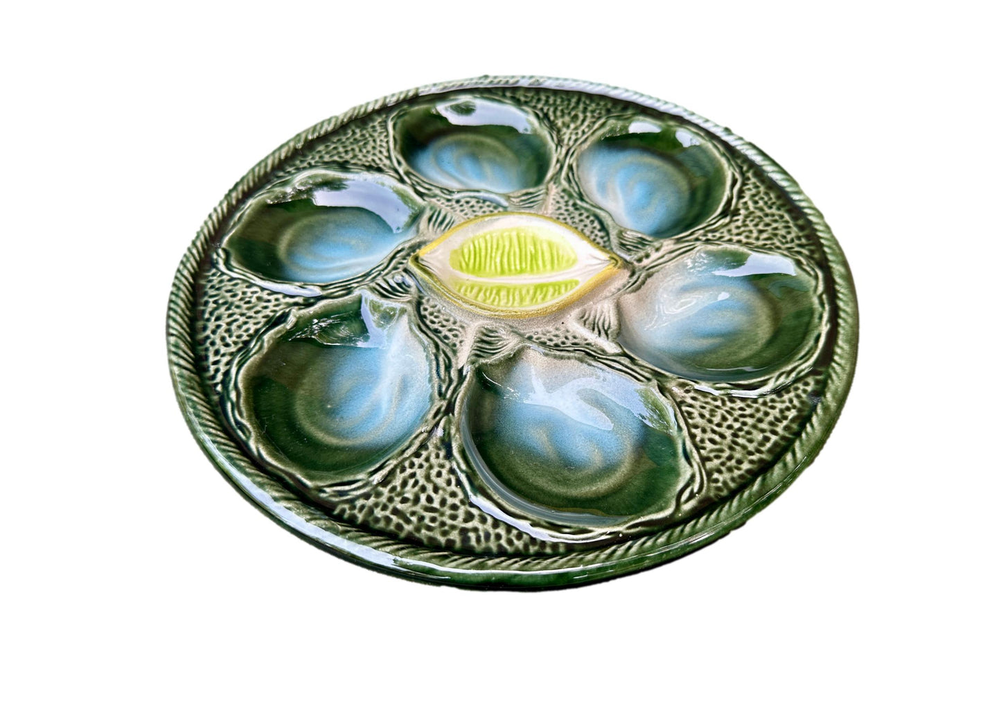 Vintage French Majolica oyster plate by Saint Clément, circa 1930, with six green-blue shell wells and a central lemon design, glazed ceramic faience, Art Deco coastal decor.
