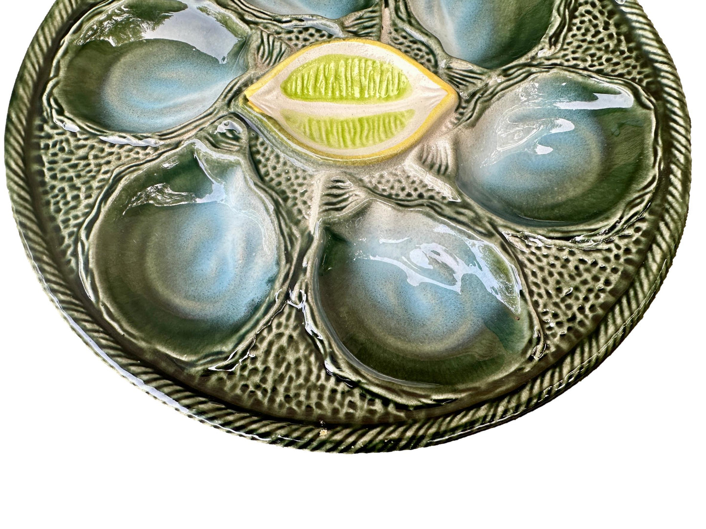 Vintage French Majolica oyster plate by Saint Clément, circa 1930, with six green-blue shell wells and a central lemon design, glazed ceramic faience, Art Deco coastal decor.