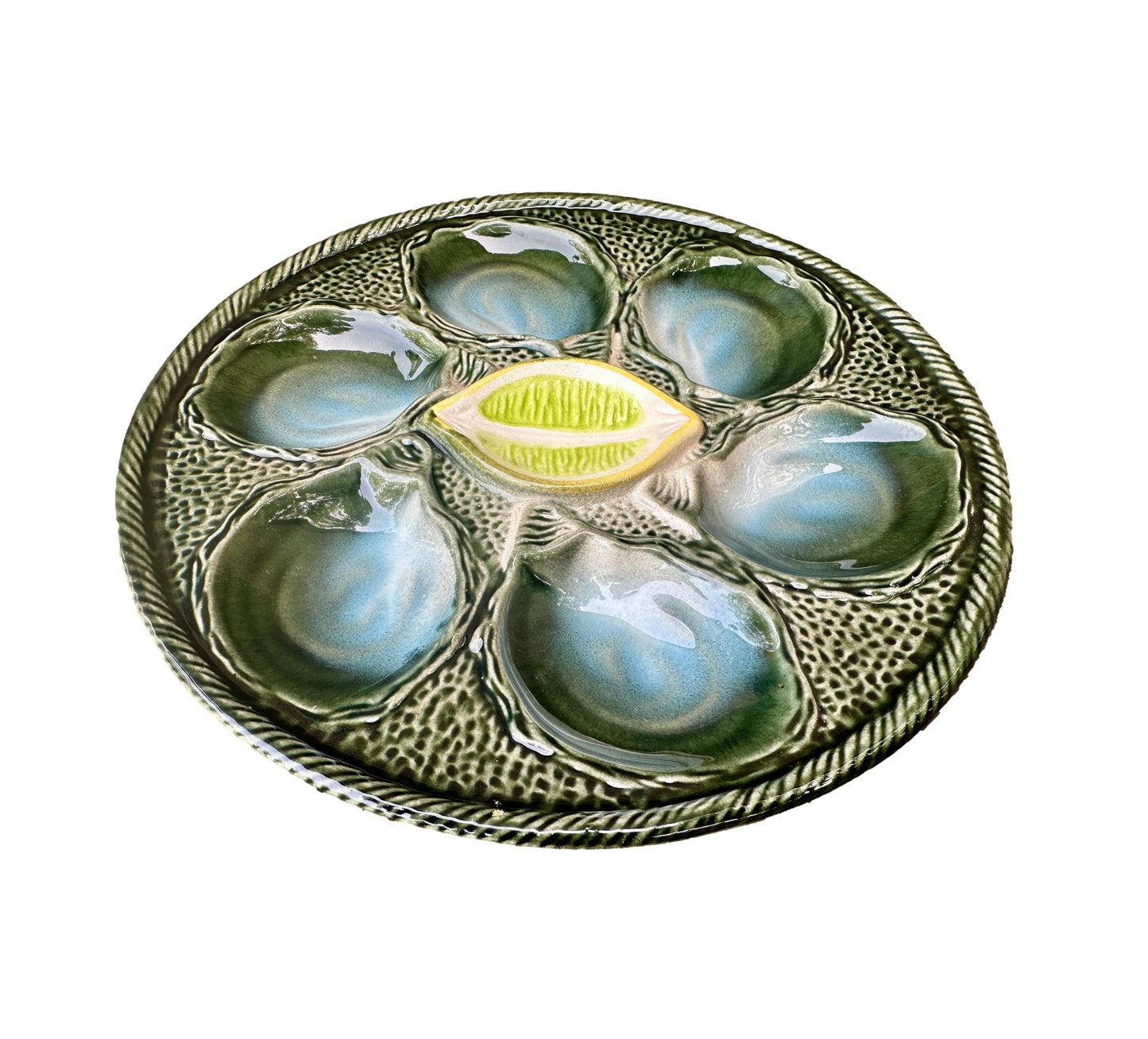 Vintage French Majolica oyster plate by Saint Clément, circa 1930, with six green-blue shell wells and a central lemon design, glazed ceramic faience, Art Deco coastal decor.