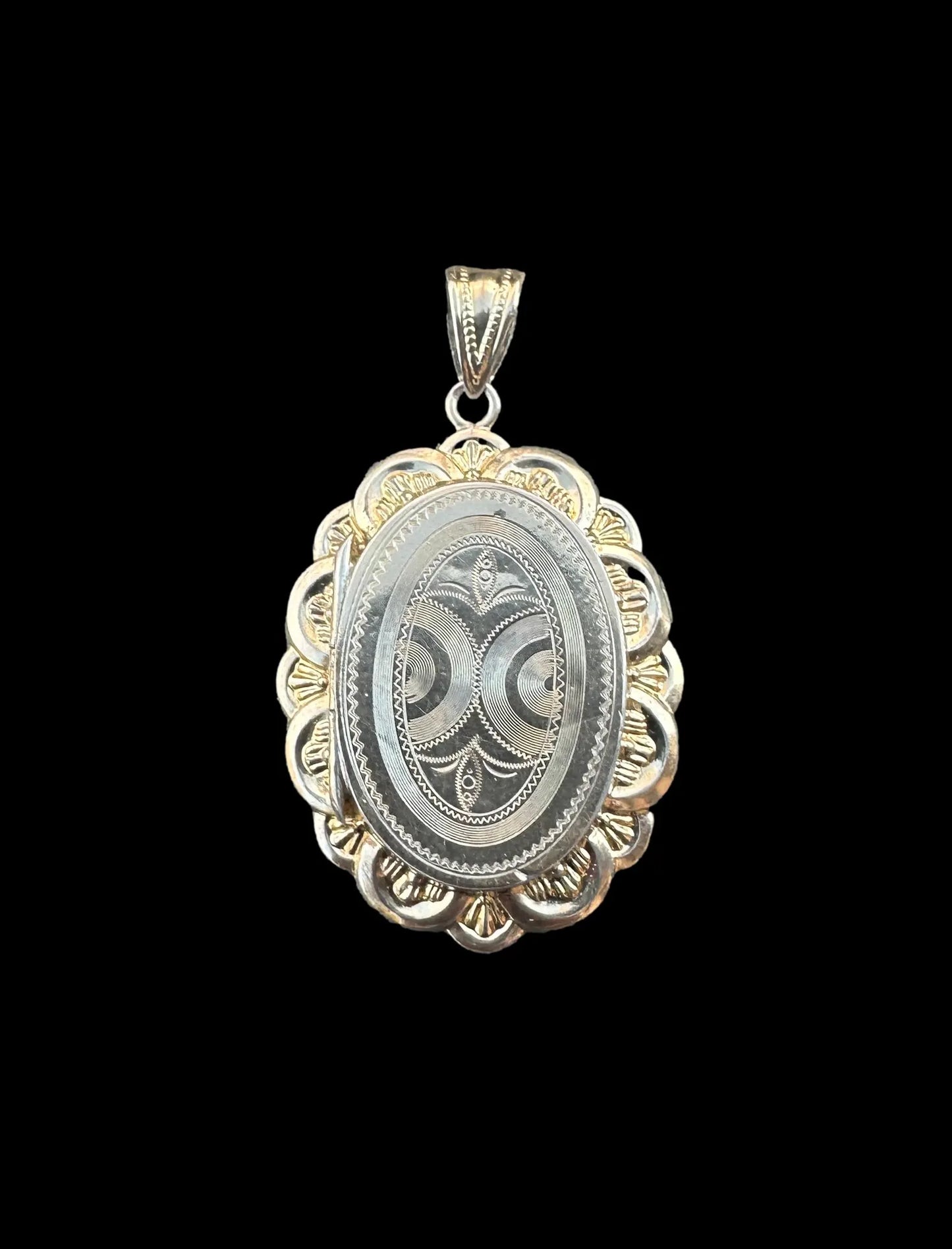 Vintage medallion necklace in sterling silver and vermeil, perfect for a precious keepsake.
