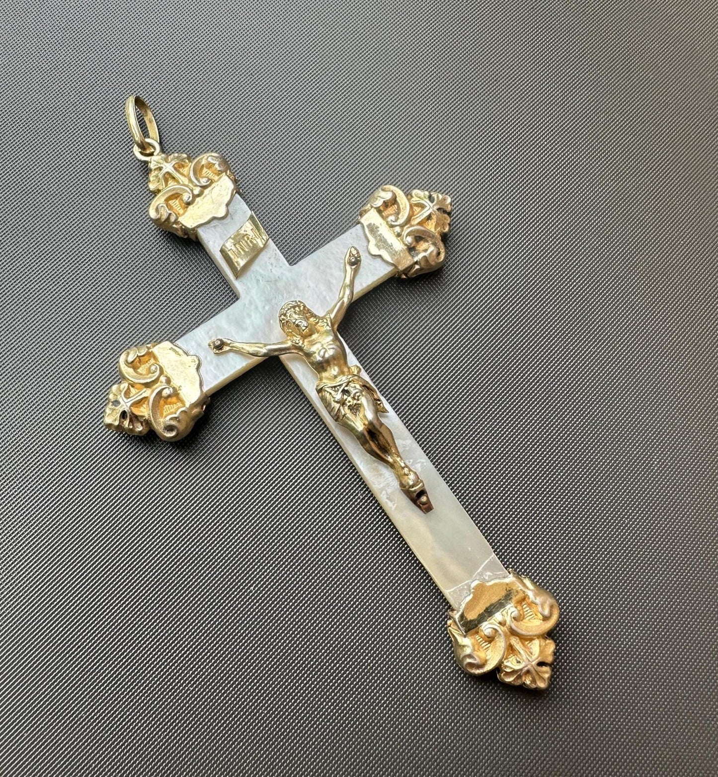 Antique religious cross pendant with fleur-de-lys vermeil tips and Christ figure