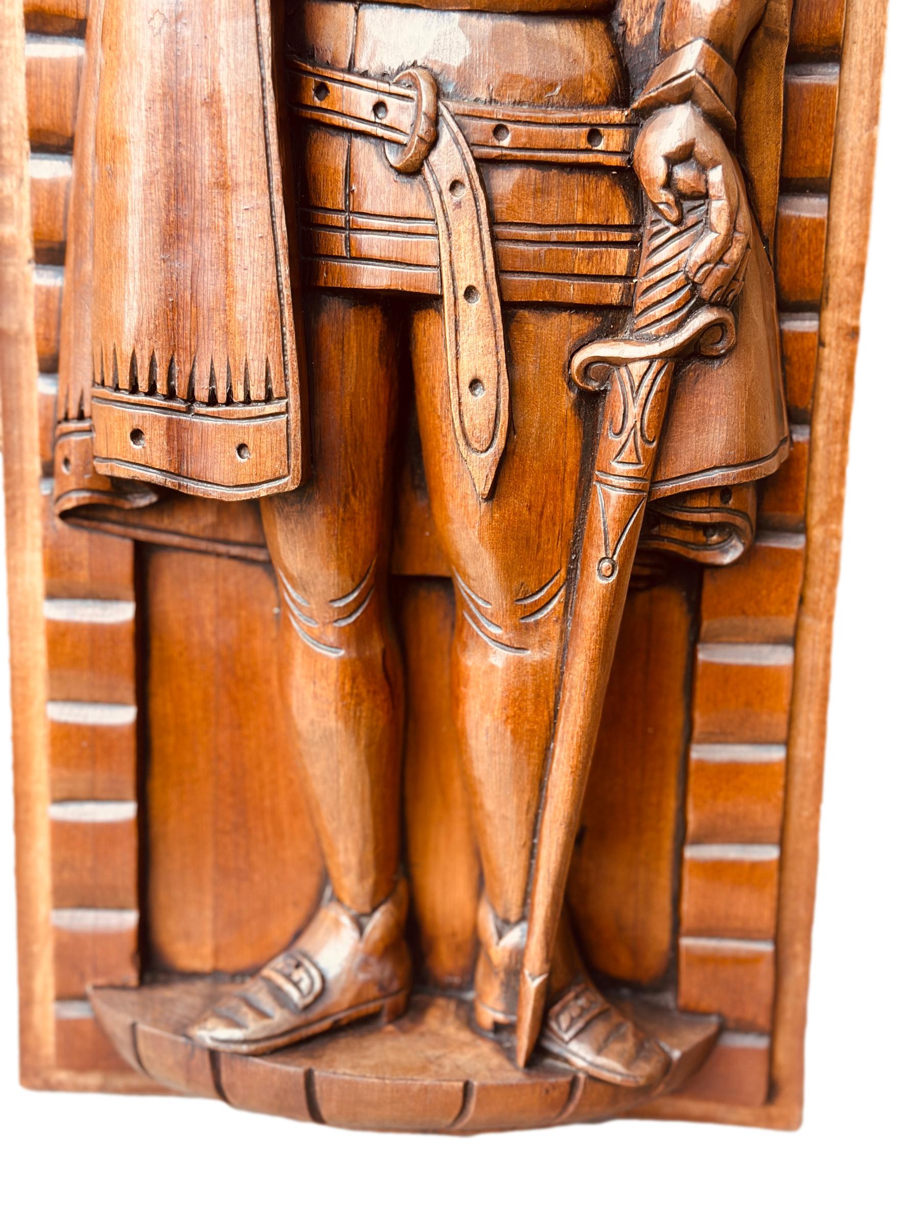 Exquisite French antique hand-carved wooden panel featuring a crowned king in Gothic style, showcasing intricate craftsmanship.