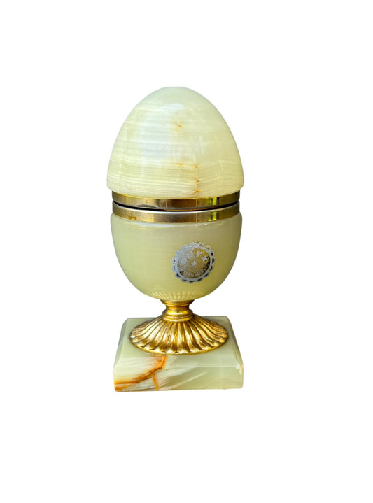 Vintage onyx egg-shaped jewelry box with gold-toned base and white-yellow stone, 1970s design