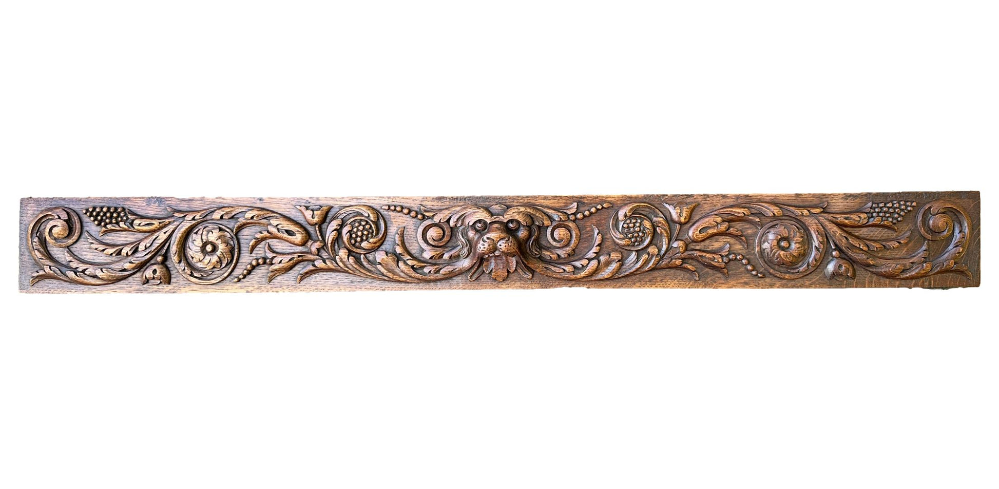Large antique French pediment in hand-carved wood withdog and floral motif