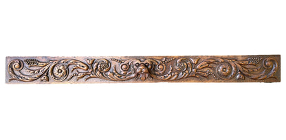 Large antique French pediment in hand-carved wood withdog and floral motif