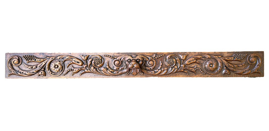 Large antique French pediment in hand-carved wood withdog and floral motif