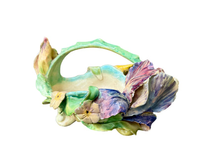 Antique French majolica iris basket by Longchamp, 19th century Terre de Fer ceramic with hand-glazed pastel flowers and Art Nouveau floral design