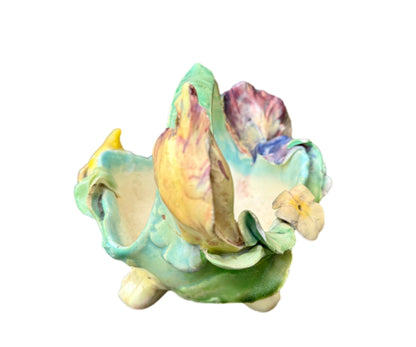 Antique French majolica iris basket by Longchamp, 19th century Terre de Fer ceramic with hand-glazed pastel flowers and Art Nouveau floral design