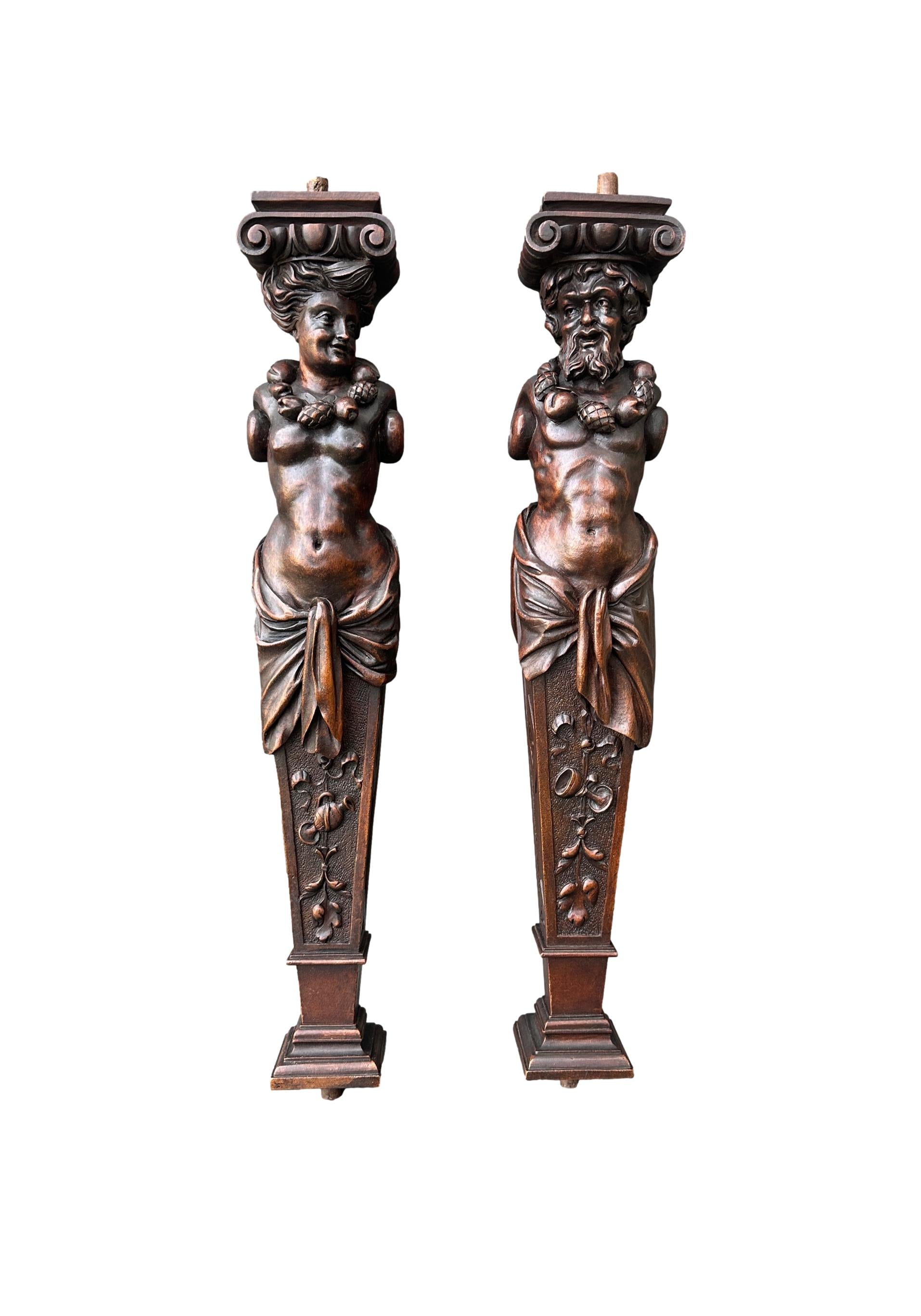 Rare pair of antique French wooden pilasters with intricate carving and aged patina