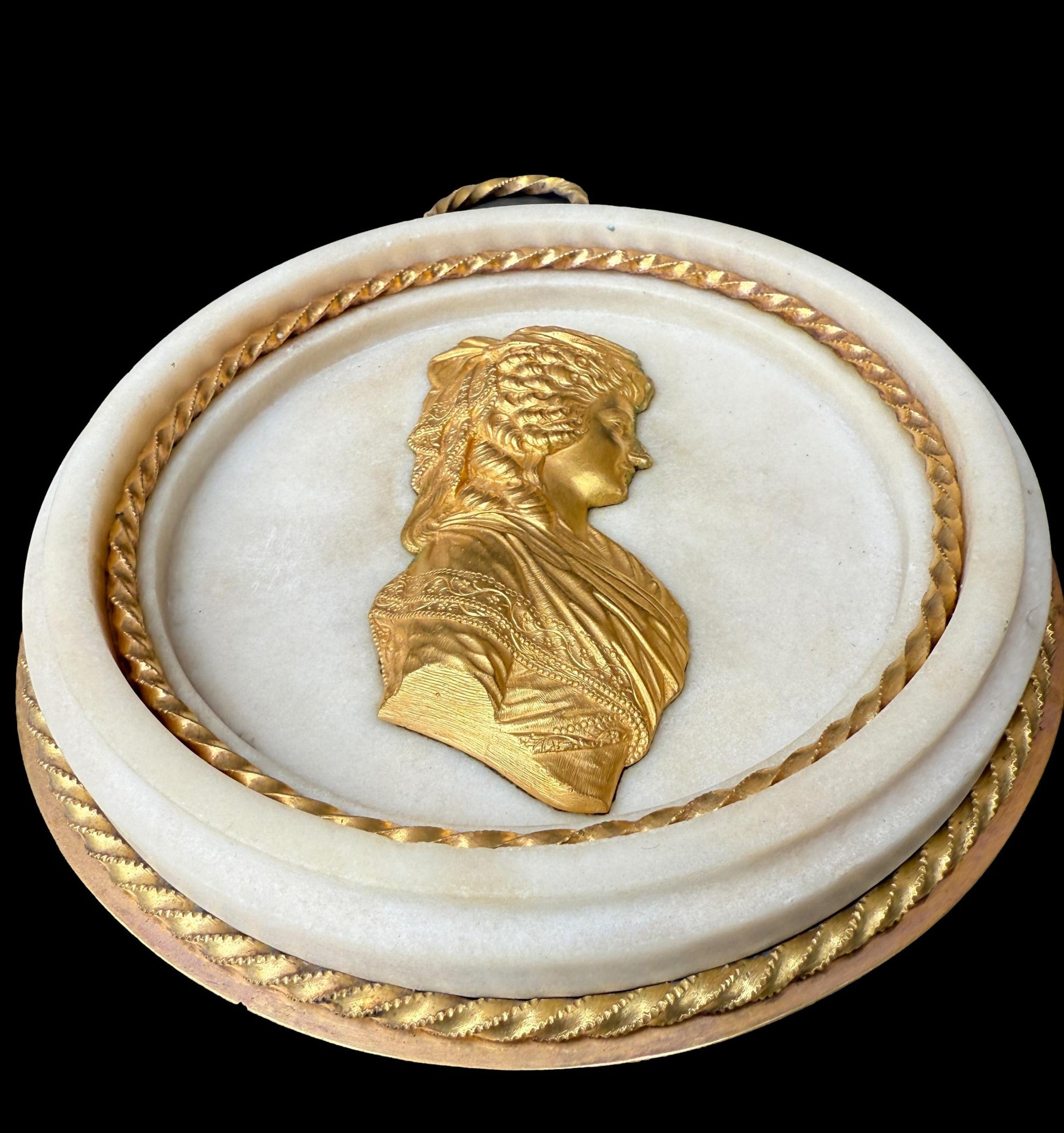 Pair of Louis XVI gilt bronze and marble portrait medallions, depicting Franz I and Maria Theresa, circa 1792