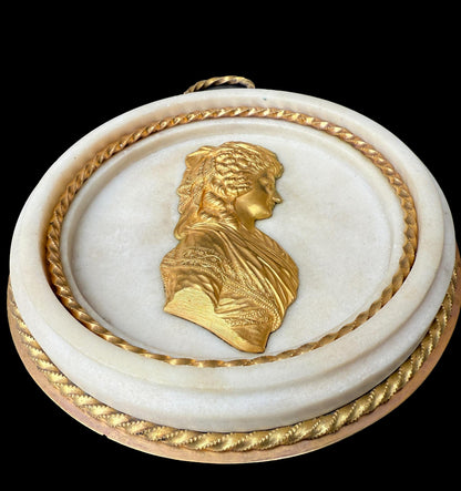 Pair of Louis XVI gilt bronze and marble portrait medallions, depicting Franz I and Maria Theresa, circa 1792