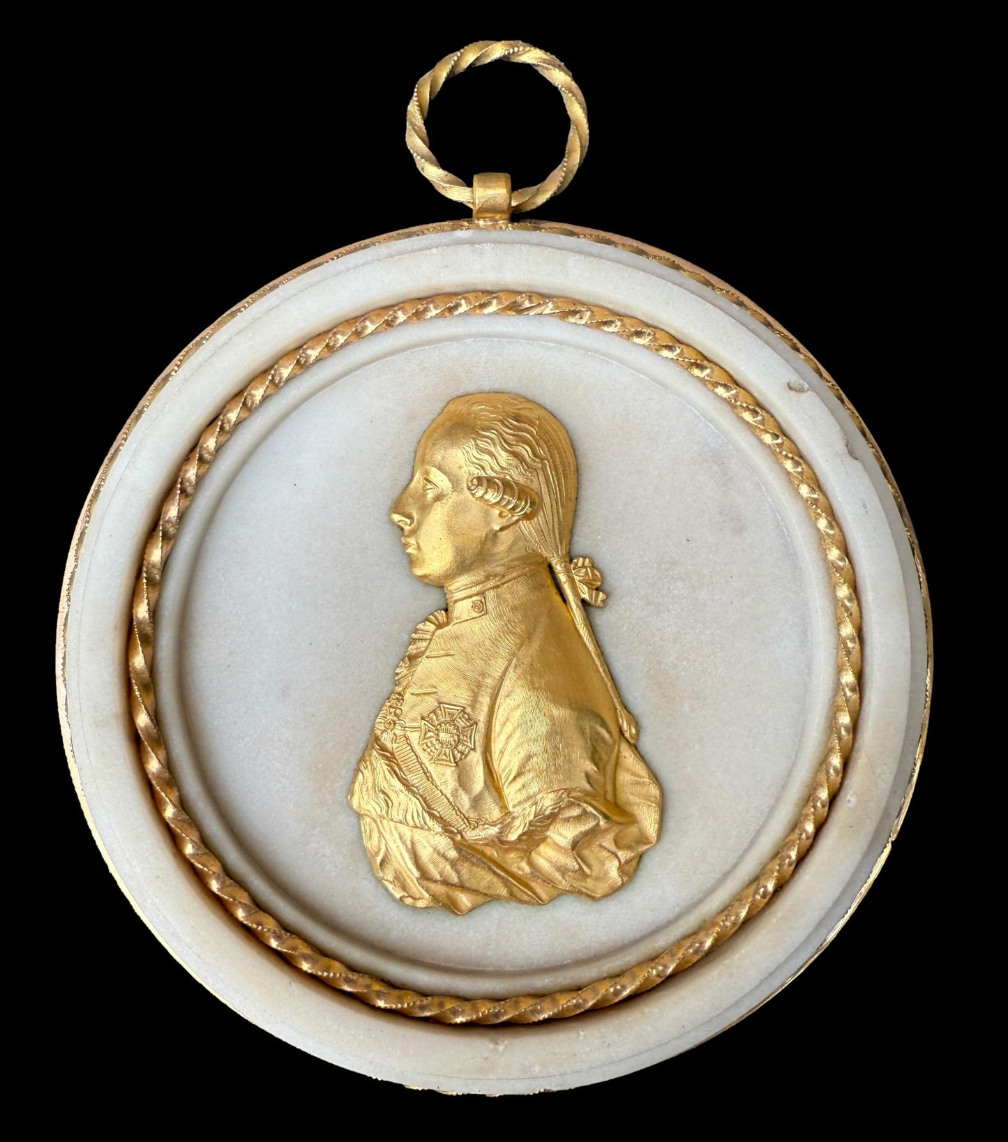Pair of Louis XVI gilt bronze and marble portrait medallions, depicting Franz I and Maria Theresa, circa 1792