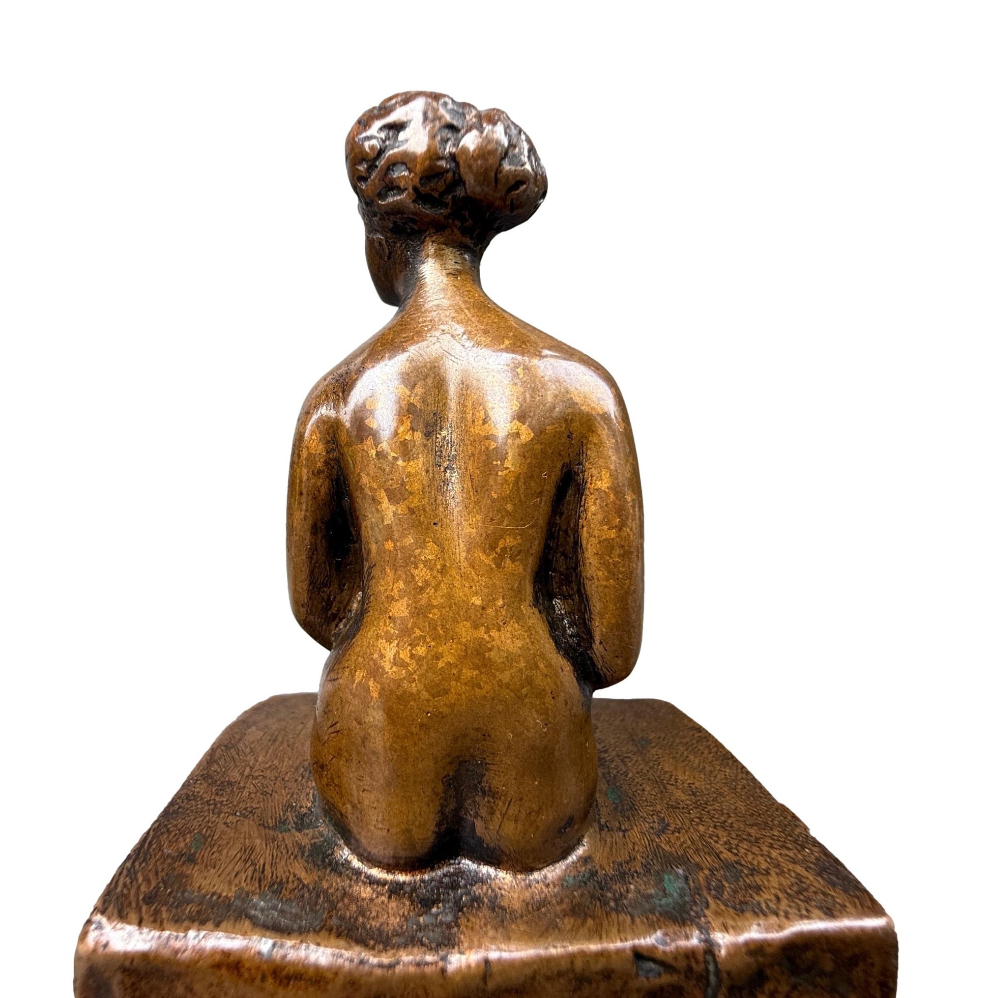 Bronze sculpture of a seated nude woman by Ary Bitter, Art Deco style with warm medal patina, signed on the back