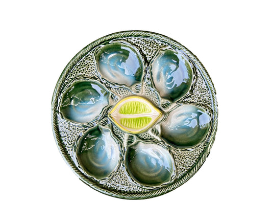 Vintage French Majolica oyster plate by Saint Clément, circa 1930, with six green-blue shell wells and a central lemon design, glazed ceramic faience, Art Deco coastal decor.