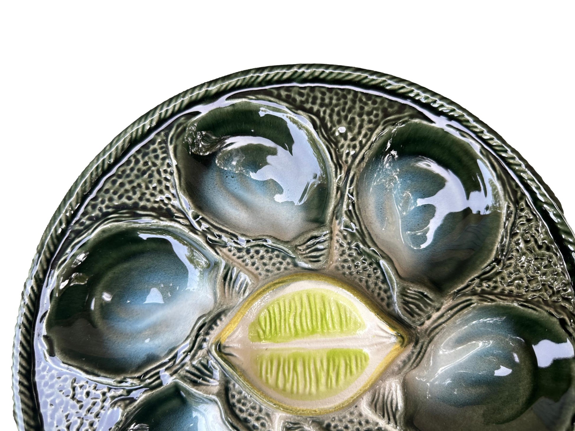 Vintage French Majolica oyster plate by Saint Clément, circa 1930, with six green-blue shell wells and a central lemon design, glazed ceramic faience, Art Deco coastal decor.