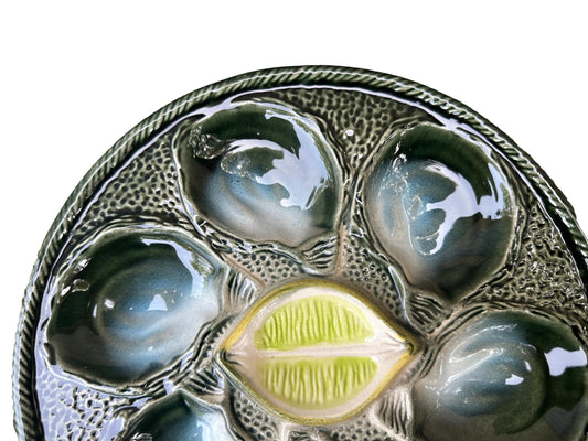 Vintage French Majolica oyster plate by Saint Clément, circa 1930, with six green-blue shell wells and a central lemon design, glazed ceramic faience, Art Deco coastal decor.