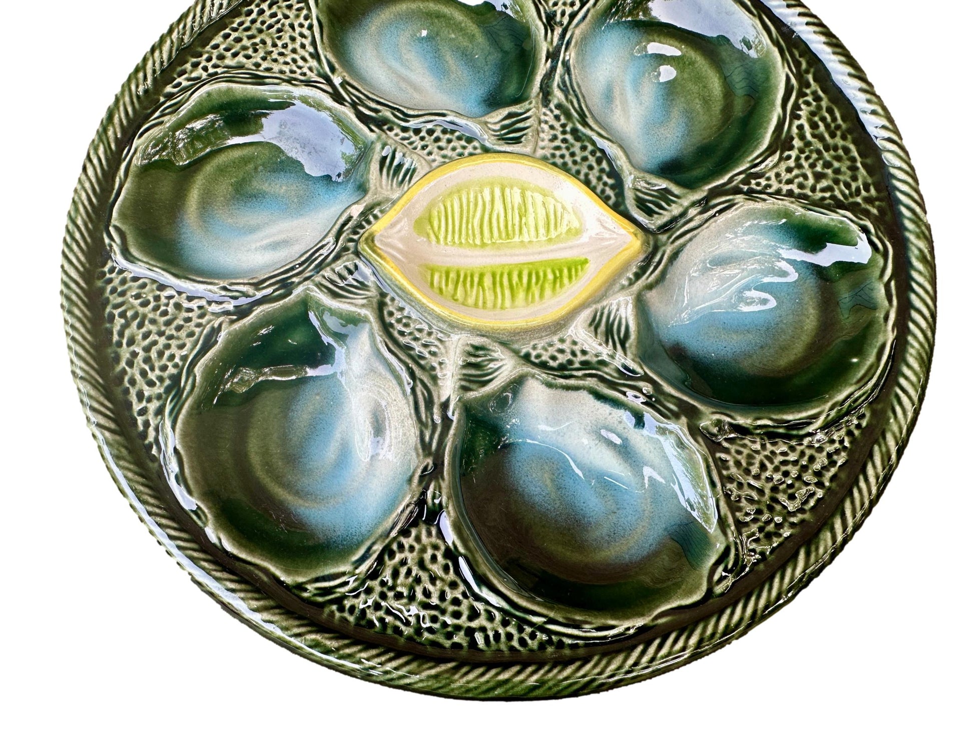 Vintage French Majolica oyster plate by Saint Clément, circa 1930, with six green-blue shell wells and a central lemon design, glazed ceramic faience, Art Deco coastal decor.
