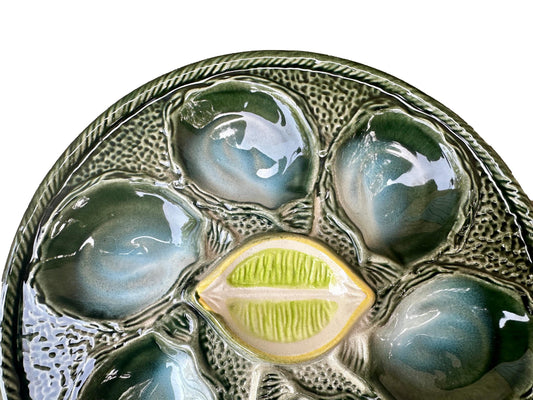 Vintage French Majolica oyster plate by Saint Clément, circa 1930, with six green-blue shell wells and a central lemon design, glazed ceramic faience, Art Deco coastal decor.