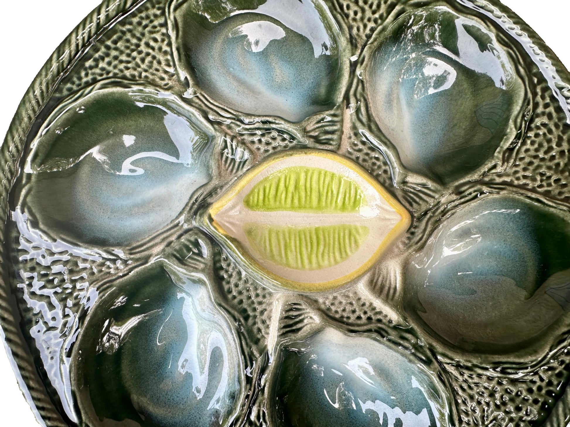 Vintage French Majolica oyster plate by Saint Clément, circa 1930, with six green-blue shell wells and a central lemon design, glazed ceramic faience, Art Deco coastal decor.