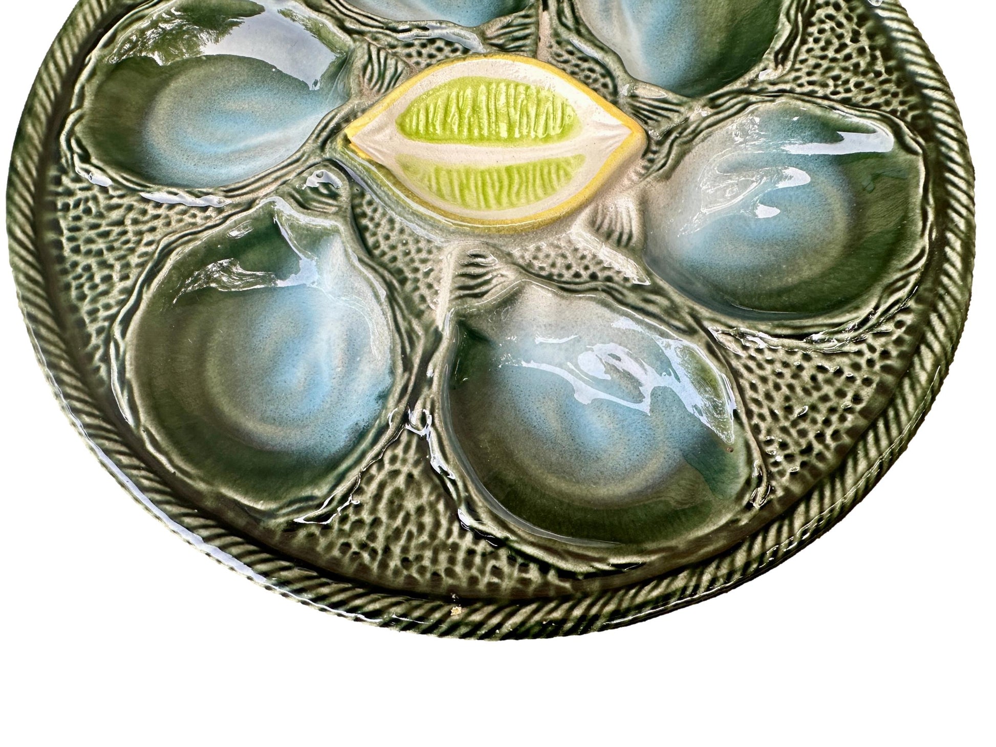 Vintage French Majolica oyster plate by Saint Clément, circa 1930, with six green-blue shell wells and a central lemon design, glazed ceramic faience, Art Deco coastal decor.
