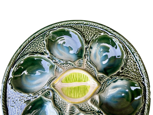Vintage French Majolica oyster plate by Saint Clément, circa 1930, with six green-blue shell wells and a central lemon design, glazed ceramic faience, Art Deco coastal decor.