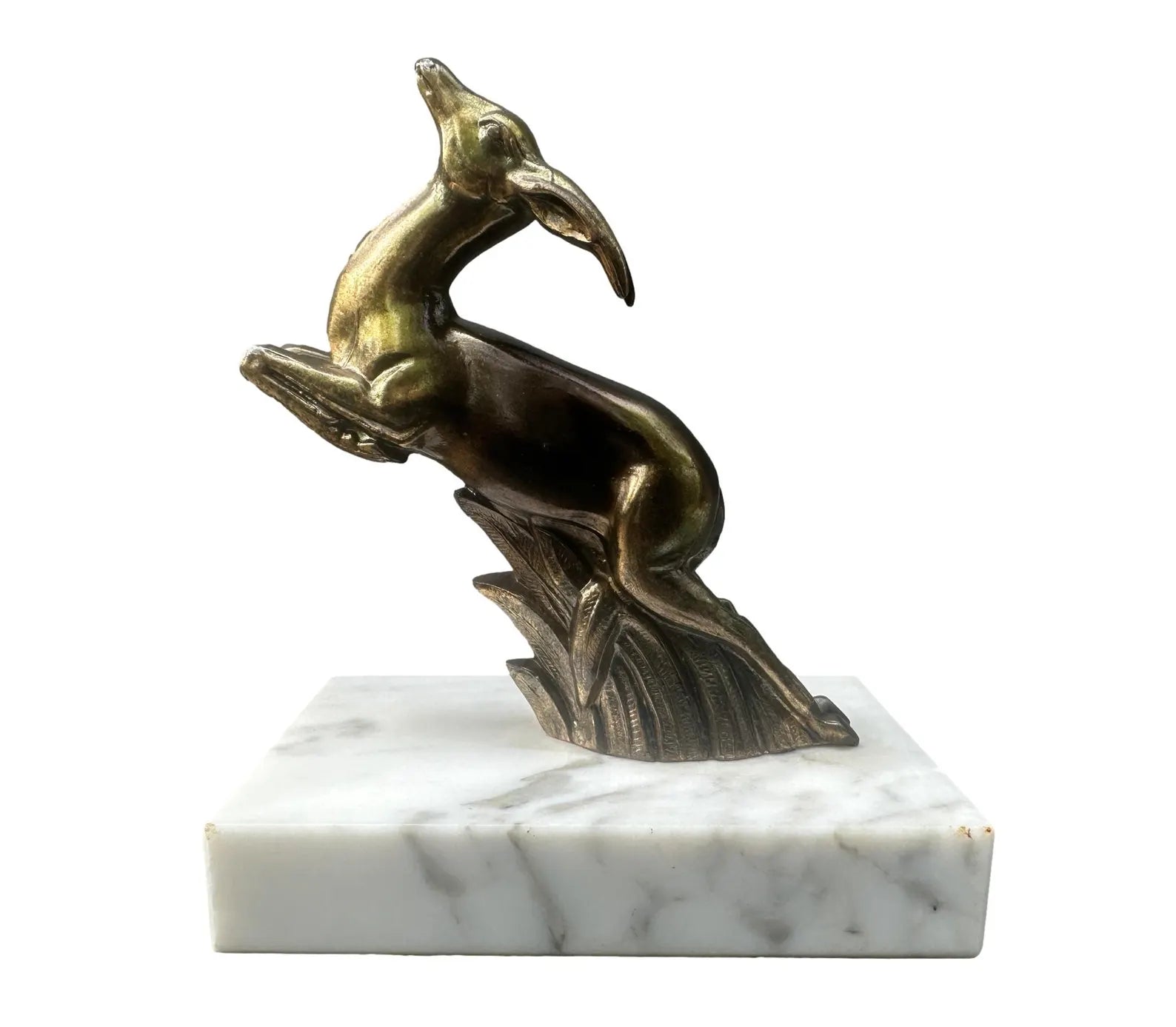 1930s French Art Deco bookends featuring elegant antelope figures on a white marble base. A beautiful vintage design that combines functionality with timeless style.