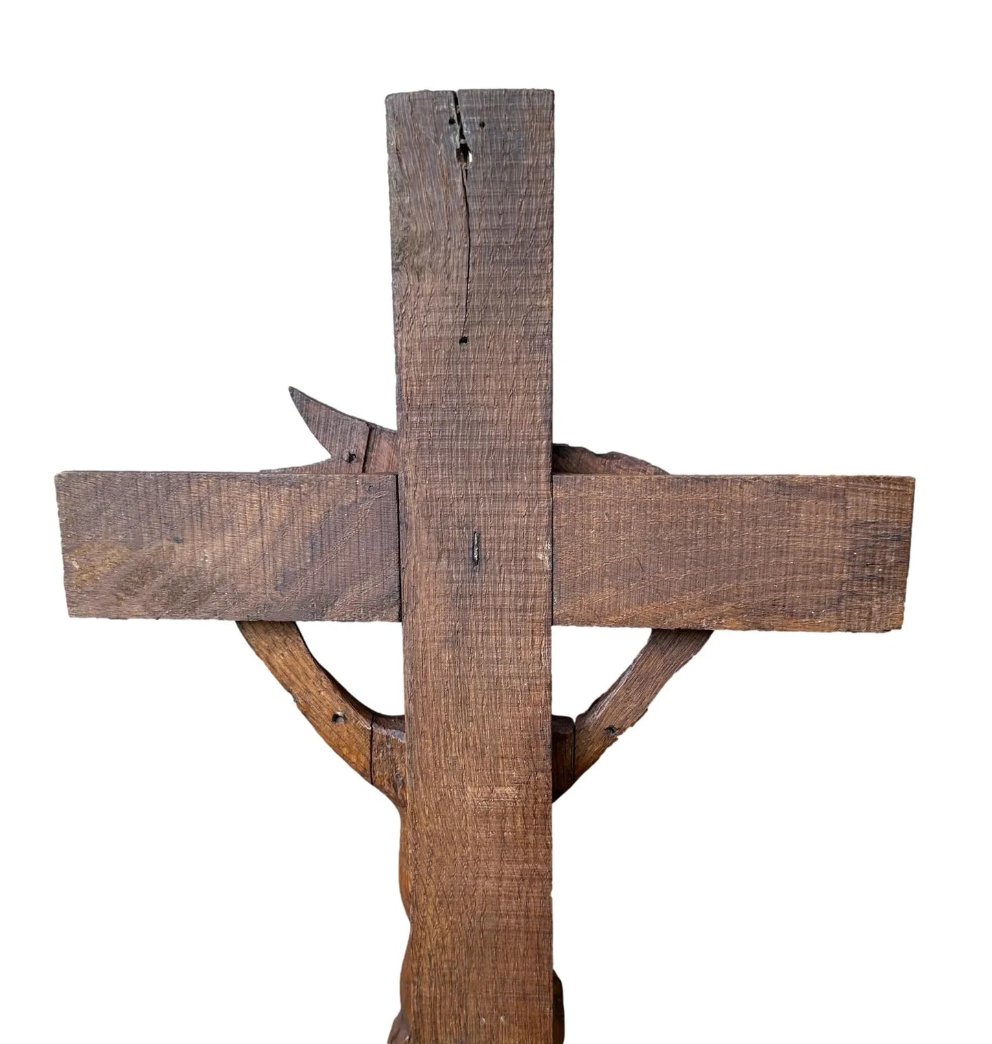 Close-up of a large hand-carved wood wall cross featuring a detailed wooden Jesus corpus statue. A stunning piece of folk art perfect for altars or rustic home decor.