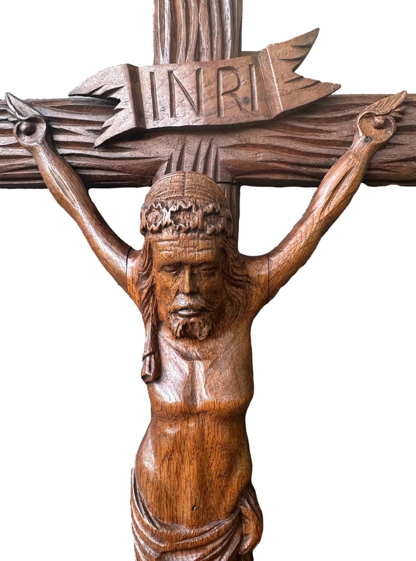 Close-up of a large hand-carved wood wall cross featuring a detailed wooden Jesus corpus statue. A stunning piece of folk art perfect for altars or rustic home decor.