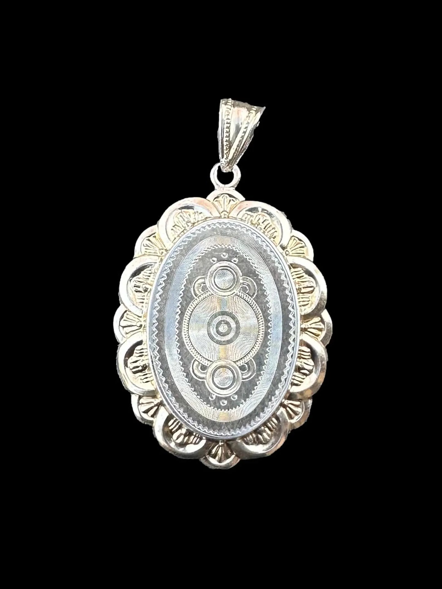 Vintage medallion necklace in sterling silver and vermeil, perfect for a precious keepsake.