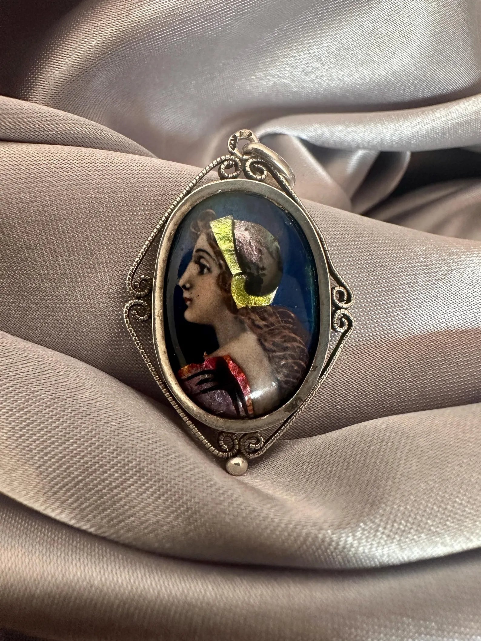 Antique Limoges enamel portrait pendant signed Sazerat, Renaissance woman painted enamel on copper, sterling silver filigree setting.