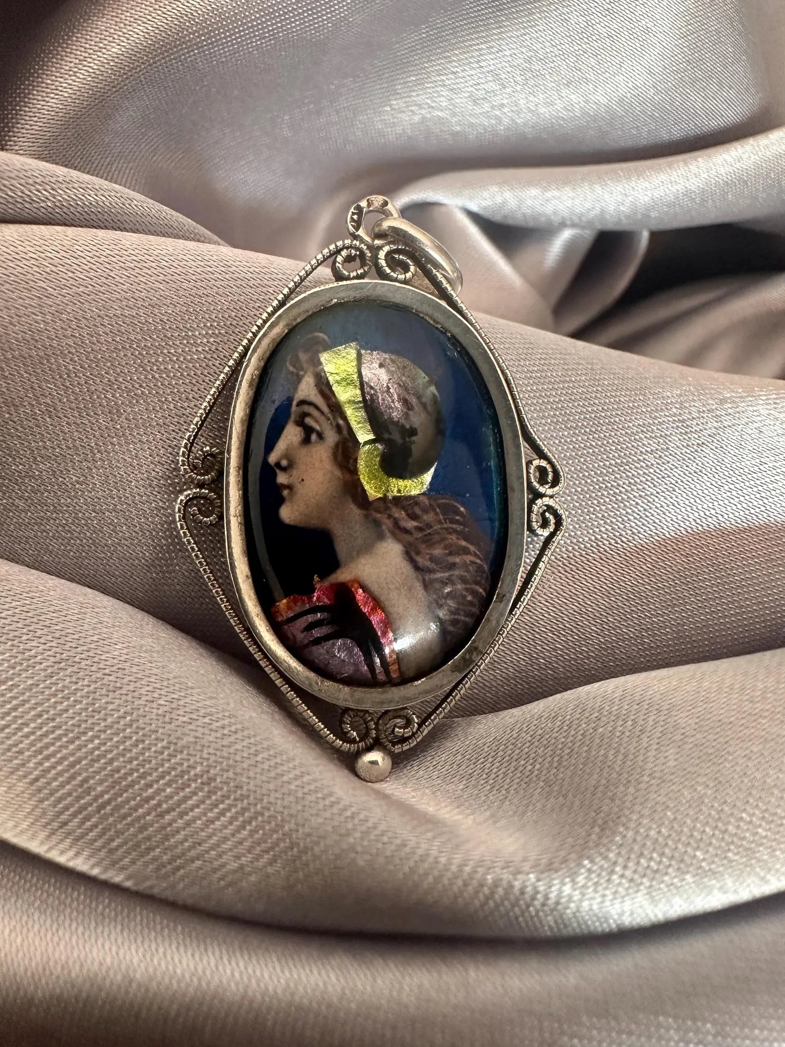 Antique Limoges enamel portrait pendant signed Sazerat, Renaissance woman painted enamel on copper, sterling silver filigree setting.