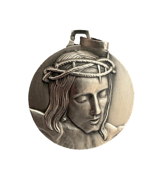 Solid silver medal with high-relief Christ crowned with thorns, Minerva hallmark, Cunfraterna di Santa Croce Bastia inscription.